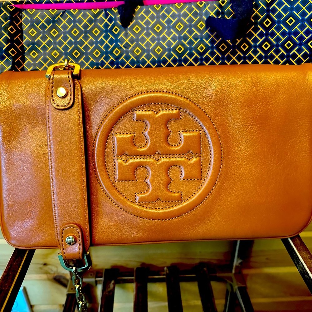 Torch Burch leather clutch with magnet closure with removable shoulder strap